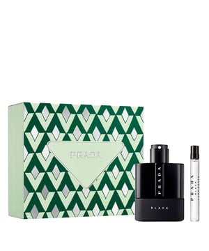 Discover the allure of Prada Luna Rossa Black, a captivating fragrance that embodies darkness and mystery. This exquisite gift set features a 100ml Eau de Parfum Spray, enriched with intoxicating amber accords, refreshing citrus, and a blend of coumarin and patchouli. The set also includes a convenient 10ml travel-size spray, perfect for on-the-go freshness. Ideal for the modern man who values sophistication and elegance, this gift set is a perfect choice for any occasion.