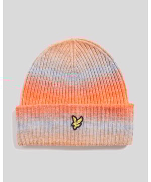 Zacht en opvallend. Deze ombre-muts vervaagt door tonale tinten met een nauwsluitende pasvorm en lichtgewicht warmte voor dagelijks gebruik. - Ombre-verloopbreipatroon - Geribbeld voor comfort en stretch - Lichtgewicht en warm