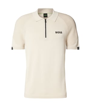 Boss Green K_Perform-Max_PL Half Zip Polo in Open Beige Elevate Your Game in Comfort and Style: Boss Green K_Perform-Max_PL Half Zip Polo in Open Beige. Step onto the green with confidence in the Boss Green K_Perform-Max_PL Half Zip Polo. Crafted for the modern athlete, this golf-inspired polo shirt blends sophisticated style with performance-enhancing features. The breathable knit fabric ensures active comfort through every swing, while the slim fit delivers a sharp, contemporary silhouette. Thoughtful design details elevate this polo beyond the ordinary. Micro-structured body mapping promotes airflow, and perforated underarms provide targeted ventilation to keep you cool and focused. The classic polo collar and short sleeves offer timeless appeal, finished with ribbed cuffs for a refined touch. This K_Perform-Max_PL polo in the elegant Open Beige hue is not only designed for performance but also with consideration for the planet. It's partly made with organic cotton, cultivated according to our strict organic standards, which prohibit the use of synthetic fertilizers, pesticides, and genetically modified seeds. Features Breathable Blend: Engineered for active comfort on and off the course. Slim Fit: Offers a modern and streamlined look. Micro-structured Body Mapping: Enhances airflow for optimal comfort. Perforated Underarms: Provides targeted ventilation. Half Zip Design: Adds a touch of sporty sophistication and adjustable ventilation. Polo Collar: Classic and versatile style. Short Sleeves: For ease of movement. Ribbed Cuffs: Offer a secure and polished finish. Standard Length: Designed for a comfortable and flattering fit. Style: 50537146
