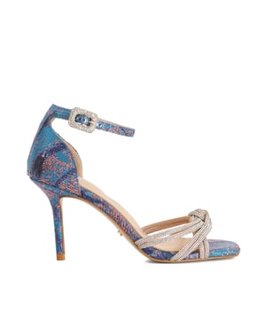 Exuding classic style, the mirror sandal is perfect for the dance floor. Showcasing a mid block heel, closed back and buckled ankle strap fastening. The Dune branded insole lends an unmistakable finish.
