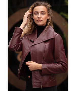 Ashwood Leather, Made exclusively from British hides,100% genuine leather.Embrace timeless elegance with the 'Isabella' Ladies Leather Wide Collar Biker Jacket. Designed to provide both comfort and style, this luxurious leather jacket is an essential piece for the modern woman's wardrobe.Crafted from premium, butter-soft leather, the Universal jacket's quality is palpable to the touch. Its subtle sheen perfectly complements the finely contoured stitching and sleek panelling, celebrating the feminine silhouette by highlighting your natural curves.The wide fashion collar adds a touch of contemporary flair to this classic design, giving it an alluring edge that easily transitions from day to night. Whether paired with casual jeans for a weekend outing or dressed up with a chic skirt for an evening affair, this jacket provides an effortlessly stylish look.Function meets fashion with the inclusion of two front zip pockets, offering convenient storage without compromising on style. The side zip fastening ensures a perfect fit, allowing you to personalize the jacket's look and feel.Inside, a soft fabric lining caresses your skin, adding to the jacket's overall comfort and wearability. Cut in a regular fit, it offers room for movement without losing its shapely appeal.