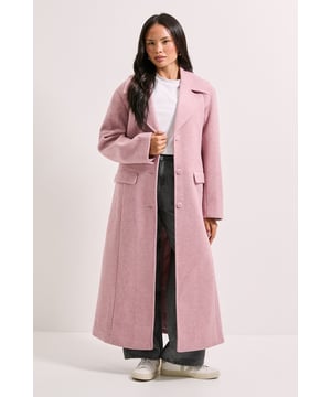 Brushed texture creates a soft, tactile finish that adds depth and warmth
        Relaxed fit design offers comfortable layering over your favourite autumn and winter outfits
        Longline silhouette provides extra coverage and creates an elegant, sophisticated profile
        Practical front pockets add functionality without compromising the coat's clean lines
        Classic collared neckline frames the face beautifully and allows for versatile styling options
    
    This Dorothy Perkins brushed longline coat combines timeless elegance with everyday practicality. The relaxed fit creates a contemporary silhouette that's perfect for layering over jumpers and jeans for weekend brunches with friends. Style with a simple white tee and wide-leg trousers as seen on our model, finishing with trainers for a casual daytime look that's effortlessly chic. The versatile design makes it ideal for family gatherings or baby showers when you want to look put-together yet comfortable. For cooler days, pair with a chunky knit scarf and ankle boots for added warmth without sacrificing style. This coat will quickly become your go-to outerwear piece, offering the perfect balance of comfort and sophistication for your casual daywear wardrobe.