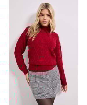Distinctive twisted cable knit pattern throughout for textural interest
        Cosy funnel neckline provides extra warmth and contemporary style
        Longline silhouette offers versatile styling options
        Ribbed trims at cuffs and hem create a polished finish
        Relaxed fit design ensures comfort for all-day wear
    
    This Dorothy Perkins jumper showcases a beautiful twisted cable knit design that adds dimension and visual interest to your casual wardrobe. The funnel neckline creates a flattering frame for your face whilst providing extra warmth during cooler days. Style this versatile piece with a checked mini skirt and tights as shown for a chic brunch outfit, or pair with your favourite jeans for family gatherings. The longline cut makes it perfect for layering over leggings or slim-fit trousers. For a complete autumn ensemble, add knee-high boots and gold-toned jewellery to reflect your sophisticated taste. This jumper transitions effortlessly from weekend coffee dates to casual office environments, making it a true wardrobe essential for the woman who values both comfort and style in her everyday attire.