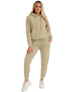 Expertly crafted for both casual outings and relaxed work wear, the Kruze Women’s Tracksuit Set delivers exceptional comfort and effortless versatility. The pullover hoodie with long sleeves offers a timeless, easy-to-style look, while the joggers feature an adjustable drawstring waistband for a perfect fit. Complete with handy side pockets and ribbed ankle cuffs, this set blends practicality with modern flair, making it an ideal choice for any occasion.(KZLS169)