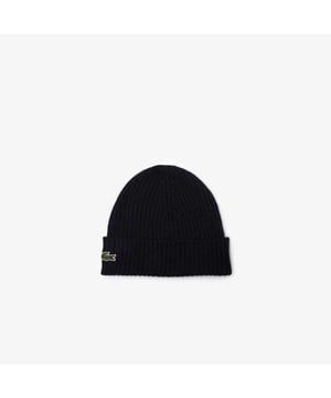
 Ga nooit weg zonder je gebreide muts. De Lacoste essential is zacht en warm, en beschermt je waar je ook naartoe gaat.

100% wol. 