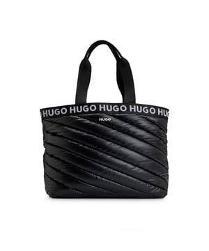 Womens HUGO Becky Diagonal Quilting Tote Bag with Logo Details in black.A signature tote bag with diagonal puffed quilting by HUGO. This accessory is trimmed with contrast logos at the topline. - Open top- Double handle- Polished silver hardware- 1 inside open pocket- 1 inside zip pocket- 1 main compartment- Fully lined- Printed logo- Approx. measurements: 34cm (H) x 48cm (L) x 17cm (W)- Main material: 100% Polyester.- Ref: 50529280-001Measurements are intended for guidance only