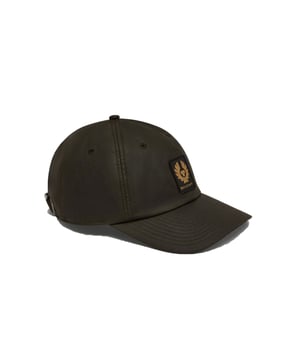 BELSTAFF PHOENIX PATCH WAXED CAP IN FADED OLIVE With a vintage vibe that conveys an adventurous tale, the Phoenix Patch Cap in Faded Olive instantly becomes a classic. It's the type of cap you pick up as you leave the house, prepared for the day. It's made to improve even more over time, taking on a distinct personality as you personalise it. Features Shell: 100% Cotton, Facing: 100% Polyester 6 oz. waxed cotton, with a unique blend of micro and technical waxes Soft-structured cap with adjustable fabric back strap Curved peak with multi-stitching detail Embroidered edge phoenix patch at front Water repellent Style: 105347