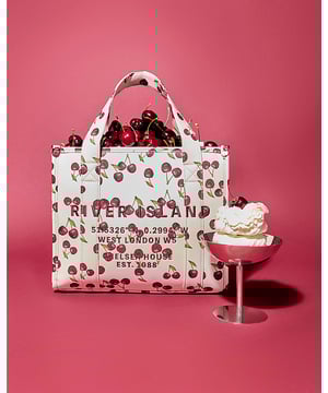 Cherry embossed print, Grab handles, Adjustable RI strap, Popper fastening, Strap drop: 65cm, Handle drop: 14cm, Dimensions: H: 28cm x D: 14cm x W: 31