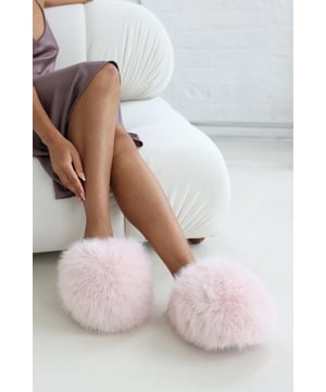 Indulge in cosy luxury with our Keira Ultimate Fluffy Faux Fur Mule Slippers. Designed with an ultra-soft faux fur exterior and plush lining, these slippers combine warmth, comfort, and glamour in one chic design. Perfect for lounging in style or keeping your feet snug on chilly days. Key Features: • Material: Ultra-soft faux fur for a luxurious, cosy feel • Design: Fluffy mule slip-on style with cushioned interior for added comfort • Closure: Easy slip-on design for effortless wear