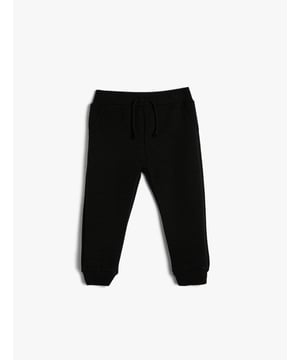 Drawstring, textured, basic, cotton sweatpants. With this outfit, your baby is safe. Our products are tested against chemicals and designed mechanically in compliance with all safety principles. They do not contain dyestuff and heavy metals which may be damaging for health or any small and sharp pieces, straps or laces that may be ingested.