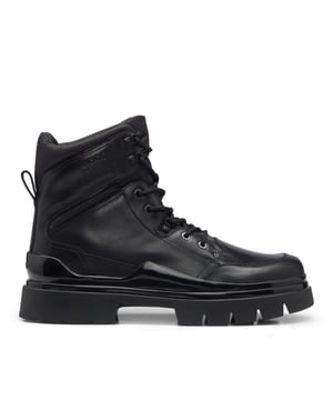 Smooth leather lace up chunky boot. Contemporary and seasonal style. Black tonal eyelets enriching the design. Branding detail on the tongue  upper side and on the back. Gradient colour and monogram animation on the innersole.