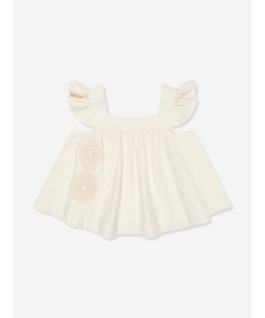 Elevate your child's fashion with the Girls Halliday Denim Top in Ivory by Zimmermann, essential for AW2024. Each detail is carefully crafted to ensure style and comfort: Luxurious Ivory Denim: Crafted in premium ivory denim, perfect for stylish occasions. Chic Minimalist Design: Combines elegance and simplicity, offering versatility and timeless appeal. Exceptional Comfort: Soft fabric ensures comfort throughout the day, ideal for both play and parties.Enhance her wardrobe with the sophistication of Zimmermann. Discover the blend of luxury and playfulness in the Girls Halliday Denim Top. Order now and watch her charm the world in impeccable style!