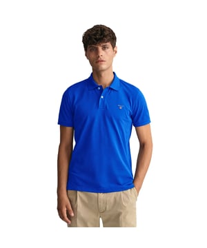 These Original Mens Designer Short Sleeve Gant Polos feature the brands Logo, a Contrasting Trim and a Button-Down Collared Neckline. Crafted With 100% Cotton, these Lightweight and breathable Regular Fit Polos are Suitable for Casual or Workwear.