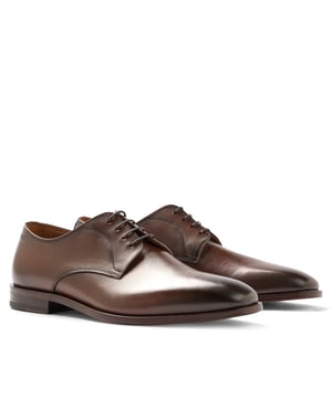 Mens BOSS Lisbon Derby Shoes in brown.- Made in Italy.- Premium BOSS business footwear.- Derby upper design in soft leather with stitching details.- Soft cognac lining and a comfortable insole for maximum cushioning and leather sole for a characterful effect.- RESPONSIBLE STYLE- Ref: 50470980-210