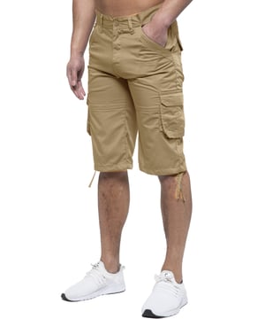 Enzo Mens Cargo Combat Jeans. 7 Pocket Design Including Single Coin Pocket. 2 Front Slash Pockets with Extra Fabric Stitching Detail. 2 Side Cargo Pockets, 2 Back Bellow Pockets with Velcro Fastening Flap. Extra Stitching Details to all Pockets. Adjustable Drawstring to the Hems. Zip Fly Fastening. Premium Quality Fabric Ideal for Casual and Heavy Duty Work Wear.