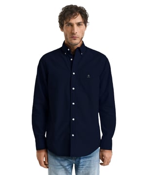 Introducing Enzo Milano Men's Shirts: the epitome of luxury. Impeccably crafted with lightweight, breathable cotton, these Regular Fit shirts feature a sophisticated Button-Down Collar and Long Sleeves for a timeless look. Each shirt is adorned with the Enzo Milano Logo, embroidered on the chest for a touch of exclusivity