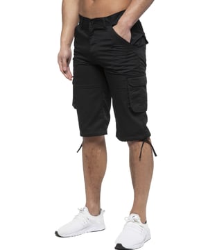 Enzo Mens Cargo Combat Jeans. 7 Pocket Design Including Single Coin Pocket. 2 Front Slash Pockets with Extra Fabric Stitching Detail. 2 Side Cargo Pockets, 2 Back Bellow Pockets with Velcro Fastening Flap. Extra Stitching Details to all Pockets. Adjustable Drawstring to the Hems. Zip Fly Fastening. Premium Quality Fabric Ideal for Casual and Heavy Duty Work Wear.