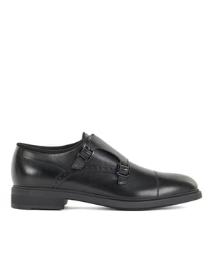 Mens BOSS Firstclass Monk Shoes in black.- Made in Italy.- New modern brogue upper design in soft italian leather with burnished finishing.- Lining made of OULAST ® fabric providing utmost thermo-regulation and breathability.- Lightweight rubber sole filled with EVA providing superior comfort.- Ref: 50460265-001