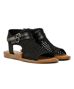 Elevate your style with these vegan sandals, featuring a woven textile upper with intricate detailing. The two faux leather straps with buckle accents add a chic touch, while the convenient zip fastening ensures a secure fit. Perfect for any occasion, these sandals combine fashion and sustainability effortlessly.
