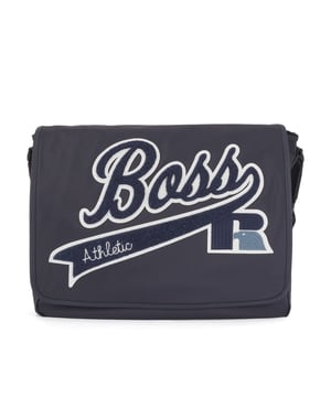 Structured nylon with firm hand feel. Main compartment with flap and velcro closure. Internal zip pocket. Adjustable shoulder strap. Capsule BOSS for Russell Athletic. Dimensions: 40 x 38 x 9 cm. Material: 100% Polyamide. Ref: 50465332410.