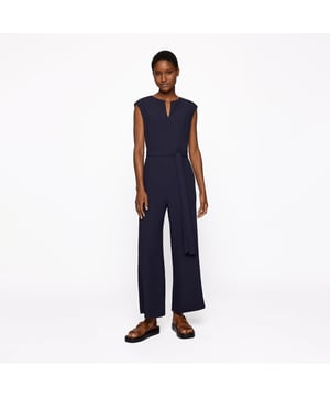 Womens BOSS Dimpa Jumpsuit in dark blue.This jumpsuit by BOSS is made from an acetate-viscose mix and has a fitted cut. It comes in a plain design with a V-neck  waistband and side pockets.- Round neck with v-cut- Sleeveless- Side pockets- Seam zipper- Tailored cut- Main fabric: 70% Acetate  30% Viscose.  Pocket lining: 100% Cotton.  Feed 1: 100% Viscose.  Dry clean.- Ref: 50439056-466