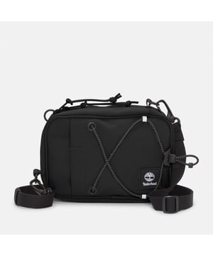 Mens Timberland Crossbody Bag in black.- Large zipper opening into main compartment.- Front panel slip pocket with bungee system and reflective details.- Adjustable shoulder strap.- Mesh back panel.- 2 ways of wearing.- Woven stacked logo badge.- Ref: A5SSY0011