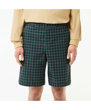 Men's Lacoste Sport Ultra-Dry checked Golf Bermuda Shorts.- Non-slip gripper tape holds top in place.- Relaxed, comfortable fit.- Ball and notebook pockets.- Elasticated waist.- Silicone crocodile. Material: 100% Polyester. Ref: FH7424IQ6.