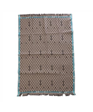 Off White Monogram Blanket in camel - black.- Allover jacquard knit monogram design.- Contrast turquoise border.- Dimensions: 138cm x 94cm.- Fabric: 100% Cotton.  Hand wash.- Ref: OMRO0080016210Measurements are intended for guidance only.