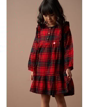 You've never plaid it so good! Look sensational in our tartan dress with cute ruffle detail in an easy to wear sillouette. 