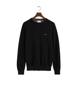 Constructed in lightweight cotton piqu�, this crew neck sweater is a simple yet versatile. Featuring a regular-fitting silhouette and our classic GANT logo embroidered at the chest, this knit is sure to become one of the most-loved pieces in your wardrobe.
Material: Cotton 100%
Regular fit  Crew neck  Ribbing at the neckline, hem and sleeve cuffs  Contrast stripe detail on inside neck rib
&nbsp;
8040521
&nbsp;
&nbsp;