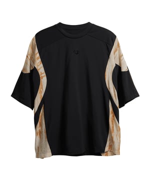 Mens Y-3 Rust Dye Short Sleeve T-Shirt in black. The rich colour variations naturally found in copper and rust inspired the Y-3 Rust Dye Short Sleeve Tee  dyed using metal and steam. It's cut with lines that resemble the curves and contours of the adidas Teamgeist football. The relaxed fit gets a tailored touch with a ribbed crewneck.- A loose-fit Y-3 tee.- Loose fit.- Ribbed crew neck.- Short sleeves.- Y-3 logo.- 55% cotton  45% polyester (recycled).  Machine washable.- Ref: IR6255