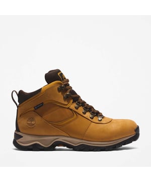 Timberland Mt Maddsen Mid Waterproof Hiking Boots in wheat.- Full-grain waterproof leather upper.- Thick laces are integrated with metal eyelets for a snug and comfortable fit.- Anti-fatigue technology enhances comfort for those who spend long days on their feet.- TimberDry™ waterproof membrane keeps your feet dry and comfortable.- Recycled rubber outsole is lugged for traction and grip on rough terrain.- Ref: A64TV2311
