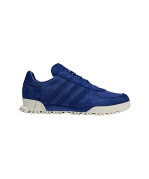 Y-3 Marathon Trail Trainers in unity ink. The Marathon Trail Shoes take the classic adidas Marathon shoes and rework them through the lens of Y-3. In a nod to the Japanese technique of Sashiko stitching  the trainers have accentuated and tonal stitching around the eyestay  heel tab  midsole and the signature 3-Stripes  with all threads intentionally hanging loosely.- Y-3 shoes inspired by traditional Sashiko stitching.- Lace closure.- Suede and textile upper.- Leather and canvas lining.- Y-3 logo.- Rubber outsole.- Suede and textile upper  Leather and textile lining  Synthetic sole.- Ref: ID4447