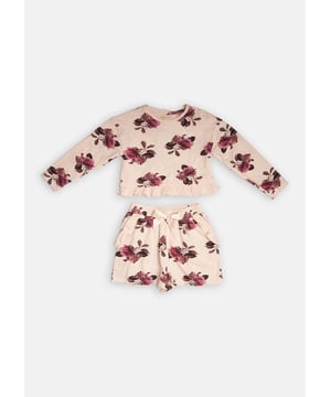Hit the snooze button! This pyjama set is made with a supersoft cotton jersey. With an all-over beautiful bloom print and pretty ruffle details match perfectly with comfortable elasticated waist shorts.   About me: 100% Cotton Look after me: Think planet. wash at 30c.