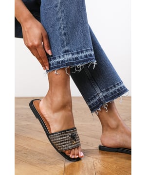 Introducing our Alaska strap sandal with front straw strap lock detail, the perfect combination of style and comfort. These sliders are an essential addition to your footwear collection, offering versatility and elegance for any occasion.
Key Features:

Lock Detail strap: The stunning lock detail strap on the front adds a touch of glamour and makes these sliders stand out from the crowd.


Chic Design: The faux leather material gives these sliders a sophisticated look that will elevate any outfit, whether you're dressing up for a special occasion or keeping it casual for daily use.
Comfortable Fit: We understand the importance of comfort, which is why these sliders are designed with a comfortable fit in mind. Slip them on effortlessly and enjoy a relaxed feel that lasts all day.
Durable Construction: Crafted with high-quality materials, these sliders are built to last. The breathable and odor-resistant foam ensures a comfortable and fresh wearing experience.
Perfect for Any Occasion:&nbsp;Whether you're headed to the beach, a casual outing, or a night out with friends, these versatile sliders are suitable for any occasion, adding a touch of elegance to your look.

Specifications:

Material: Faux Leather
Closure: Slip-on
Sole: Rubber sole for comfort and traction

Invest in our Alaska strap sandal with front straw strap lock detail and experience the perfect blend of style, comfort, and durability. Step out with confidence and make a fashion statement with every stride.