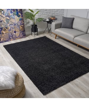 
Modern vloerkleed uit de Shaggy Soft collectie. - 160x230 CM   Shaggy tapijten zijn er in allerlei soorten en maten. Zeer mooi en warm hoogpolig vloerkleed. Ideaal in je woonkamer, slaapkamer of onder de eettafel. - Vlekbestendig en onderhoudsvriendelijk omdat het kleed is gemaakt van synthetische vezels. - Kleurvast, waterafstotend, antistatisch en anti-allergisch. - Naast een zacht en comfortabel gevoel beschikt dit materiaal over diverse goede eigenschappen waardoor het tapijt pluisvrij en gemakkelijk schoon te maken is. Productspecificaties: 100% Soft Touch Polypropyleen Poolhoogte : 35mm Gewicht = 2.400gr/m² Geluiddempend Geschikt voor vloerverwarming Anti-statisch en Anti-allergisch Kleurvast en waterafstotend Merk: Muratap Materiaal: Synthetisch Kleur: Zwart Afmetingen: 160x230 CM EAN: 8438475546211