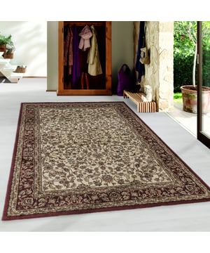 
Voeg een vleugje Oosterse elegantie toe aan je interieur met het Tapijtenloods Mokhtar vloerkleed. Dit klassieke, laagpolige vloerkleed in rood en crème tinten brengt warmte en sfeer in elke ruimte. Met zijn afmetingen van 200x290 cm is het ideaal voor de woonkamer, slaapkamer of zelfs de kinderkamer. Het symmetrische patroon geeft een gevoel van evenwicht en rust, terwijl de zachte synthetische materialen zorgen voor comfort onder je voeten.Geïnspireerd op traditionele Oosterse designs, past dit vloerkleed moeiteloos in zowel een modern als een klassiek interieur. De laagpolige structuur maakt het vloerkleed makkelijk te onderhouden en geschikt voor diverse ruimtes, van de hal tot de werkkamer. Dankzij de duurzame constructie en het anti-statische materiaal heb je jarenlang plezier van dit prachtige vloerkleed. Bovendien is het zelfs geschikt voor de babykamer, waardoor je een warme en comfortabele omgeving creëert voor de allerkleinsten.KleurRood, CremeMateriaalSynthetischAfmetingen200x290 cmHoogte1 cmGewicht12 kgVormRechthoekStijlKlassiekGeschikt voor ruimteWoonkamer | Werkkamer | Slaapkamer | Kinderkamer | Hal | KeukenSpeciaal geschikt voor babykamerJaType poligLaagpoligType vloerkleedVloerkleedAantal stuks in verpakking1 stuk(s)Voor binnen of buitenVoor binnenPatroonSymmetrisch patroon
