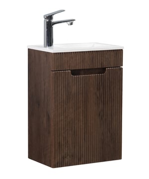 
Toiletmeubel Thermis inclusief onderkast en wastafel.Dit fonteinmeubel is zeer geschikt voor zowel kleine als grotere toiletruimtes en is bedoeld om extra ruimte te creëren. De deur van de onderkast is uitgevoerd met unieke ribbelstructuur. De wastafelkast is gemonteerd en heeft een naar links draaiende deur. Deze draairichting kan niet worden aangepast. De wastafel kan wel in de gewenste richting geplaatst worden. Een afvoer kan enkel via de muurzijde van de wastafelkast worden gemonteerd omdat de onderkant vast de wastafelkast dicht is. Toiletmeubel Thermis is met soft-close sluiting afgesteld en wordt geleverd inclusief bevestigingsmateriaal, maar zonder kraan, afvoerplug of sifon.Kenmerken- Compleet toiletmeubel met wastafelkast en wastafel.- Veel bergruimte in de wastafelkast- De wastafel wordt geleverd met overloop- Gemonteerd in de verpakking- Inclusief montagemateriaal- Gemaakt van hoogwaardige Merk: Badplaats Kleur: Hout-look