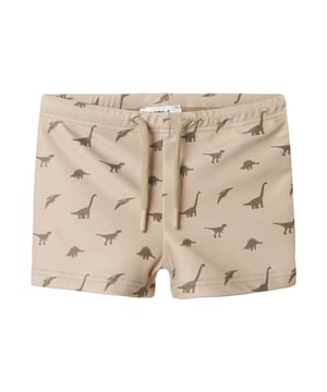 
De strakke zwembroek van Name It is perfect voor jonge dinofans die klaar zijn voor zon, zee en zwembad. Deze jongens zwembroek is gemaakt van stretchmateriaal met minstens 50% gerecycled polyester en biedt een comfortabele, aansluitende pasvorm. De elastische taille met strikkoord en vaste riem zorgt voor een stevige fit tijdens het spelen en zwemmen.