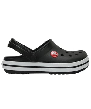 
De Crocs Crocband Clog T Black is een veelzijdige en comfortabele instapper voor kinderen. Het zwarte bovenwerk heeft een stoere uitstraling die gemakkelijk te combineren is met verschillende outfits, van casual tot sportief. De Croslite™-technologie zorgt voor een lichte, dempende pasvorm die de hele dag door comfort biedt, terwijl de verhoogde rubberen band rond de zool een sportieve look geeft. De ventilatiegaatjes zorgen voor ademend vermogen en houden de voeten van je kind koel en droog. Deze instappers zijn perfect voor dagelijks gebruik en bieden uitstekende ondersteuning en grip dankzij de antislipzool. De Crocs Crocband Clog T Black is ideaal voor kinderen die van gemak, comfort en een tijdloze stijl houden!