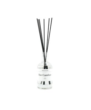 
INTERIOR PERFUME- These  'Cosmopolitan City' reed diffusers are not only fashionable to look at, they also smell fantastic! Each of them tells a story. The Cosmopolitan Cities fragrance collection is Housevitamin’s ode to the cosmopolitan cities that have influenced so many of us. The home fragrance is presented in a simple and elegant glass bottle wth black sticks. These cities are the places for hopes and dreams and are all bursting with creativity and fashion.They have so many stories to tell.  Rue Cambon captures the history and memories of Coco Chanel: it is in this place where this fashion icon wrote history and would never be forgotten. We have tried to capture the Paris 'Joie de Vivre' in this bottle of reed diffuser. Give it up for Paris: "We’ll always have Paris". Important features:- Made of glass- A scent of bergamot- Volume: 100ml- Including black sticks- Size bottle:: 5,5x5,5x12,5cm - Size bottle with sticks: 5,5xx23 cm- Size packing: 6x23cm- Regularly turn the sticks, so you continue to smell the fragrance well. Styling tip: Where could your home use this good smelling piece of art? Merk: Reed Diffuser - Rue Cambon Paris - 100ml