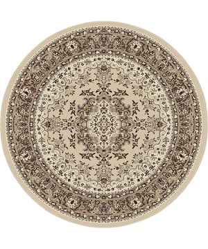 
- 240 CM ROND   Nain Collectie Oosterse tapijten brengen de elegante stijl van klassieke Perzische tapijten naar jouw interieur. Met een uniek design en hoogwaardige materialen zijn deze vloerkleden de perfecte keuze voor zowel moderne als klassieke woonruimtes. Geef je woonkamer een warme, luxe uitstraling met dit tijdloze tapijt. Kenmerken: Authentiek Oosters Design: Prachtig patroon dat perfect past in elk interieur. Duurzaam en Onderhoudsvriendelijk: Kleurvast, waterafstotend en eenvoudig schoon te maken. Praktische Voordelen: Geluiddempend, geschikt voor vloerverwarming en anti-allergisch. Vormopties: Verkrijgbaar in verschillende maten en ook in rond formaat, waardoor het perfect past in elke ruimte. Materiaal: Merk: Muratap Materiaal: Polypropyleen Kleur: Creme Afmetingen: 240 CM ROND Overig: Anti-statisch en Anti-allergisch , Kleurvast en waterafstotend, Geschikt voor vloerverwarming, Geluiddempend, Keurmerk OEKO-TEX100