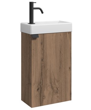 
Toiletmeubel Apollo inclusief onderkast en wastafel. De wastafelkast is een bouwpakket en heeft een deur die zowel links als rechtsom geplaatst kan worden. De wastafel kan ook in de gewenste richting geplaatst worden. Een afvoer kan enkel via de muurzijde van de wastafelkast worden gemonteerd omdat de onderkant vast de wastafelkast dicht is. Toiletmeubel Apollo wordt geleverd zonder soft-close sluiting, afvoerplug, kraan en sifon.AfmetingenOnderkast met wastafel: 40 x 22 x 68cm Kenmerken- Toiletmeubel bestaande uit onderkast en wastafel.- Veel bergruimte in de wastafelkast- De wastafel wordt geleverd met overloop-Ongemonteerd verpakt - Inclusief montagemateriaal- Gemaakt van hoogwaardige kwaliteit spaanplaatDit toiletmeubel wordt geleverd in één doos. Merk: Badplaats Kleur: Bruin eiken
