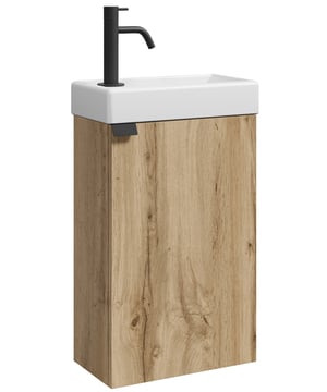 
Toiletmeubel Apollo inclusief onderkast en wastafel. De wastafelkast is een bouwpakket en heeft een deur die zowel links als rechtsom geplaatst kan worden. De wastafel kan ook in de gewenste richting geplaatst worden. Een afvoer kan enkel via de muurzijde van de wastafelkast worden gemonteerd omdat de onderkant vast de wastafelkast dicht is. Toiletmeubel Apollo wordt geleverd zonder soft-close sluiting, afvoerplug, kraan en sifon.AfmetingenOnderkast met wastafel: 40 x 22 x 68cm Kenmerken- Toiletmeubel bestaande uit onderkast en wastafel.- Veel bergruimte in de wastafelkast- De wastafel wordt geleverd met overloop-Ongemonteerd verpakt - Inclusief montagemateriaal- Gemaakt van hoogwaardige kwaliteit spaanplaatDit toiletmeubel wordt geleverd in één doos. Merk: Badplaats Kleur: Eiken