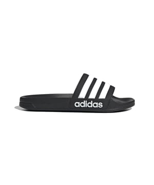 
Adilette Shower badslippers 

 De Adilette shower badslippers zijn ideaal voor bij het zwembad, douche of strand. Deze badslippers zijn gemaakt voor een heerlijke zomerdag bij het water. Door de slipperconstructie sluiten de badslippers nauw rond je voet en stap je er zo weer uit. 

 Adillete Shower badslippers kopen?

 Deze zwarte badslipper van Adidas heeft een voorgevormde voetbed wat zorgt dat je gelijk lekker loopt op deze badslippers en ze dus niet eerst hoeft in te lopen. Door de Cloudfoam-middenzool voelt deze badslipper comfortabel aan de voet. De band van deze badslipper is gemaakt van textiel, met de inconische  De naam van Adidas staat op de zijkant van de slipper. 



Maatadvies: Adidas Slippers vallen klein uit, bestel minimaal 1 maat groter dan je schoenmaat

 Handig om te weten:

 - Pasvorm: Valt klein uit 
-