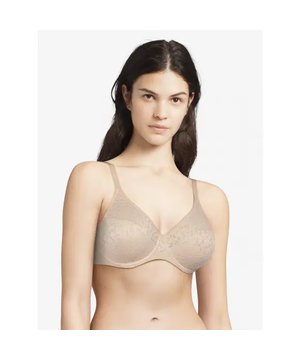 
De Norah Comfort Underwire combineert volledige ondersteuning met ongeëvenaard comfort en wordt jouw nieuwe go-to-bh. De lange, boterzachte band zorgt voor een gladmakend effect op de rug. De bloemdetails over de hele cup zorgen voor een unieke update van je dagelijkse naadloze bh, terwijl ze onzichtbaar blijven onder elk topje.


 * Nieuwe en innovatieve ongevoerde vorm met naadloos comfort


 * Interne naadconstructie langs de onderkant voor extra lift


 * Stretchkant met vrouwelijk bloemmotief


 * Meshvoering langs de bovenkant


 * Doorzichtigheid in het midden


 * Hoge turnpakjeband om de rug glad te strijken


 * Versterkte bandjes voor ondersteuning en comfort de hele dag door


 * Labelloze band


 * Ontworpen in Frankrijk


Tips van onze Fit Experts

"Wauw! Eindelijk de bh waar alle fitters op hebben gewacht! Ik vind het geweldig dat deze bh dezelfde ondersteuning biedt als een cup met naad, maar dan met de dekking en onzichtbaarheid van een T-shirt-bh. Perfect voor iedereen die een naadloze look wil. En Comfortabeler en boterzacht kan niet!"


Redacteur beoordelingen

"Chantelle is een opvallend merk in Franse lingerie geworden met zijn lijn comfortabele, stijlvolle, duurzame bh's die beschikbaar zijn voor alle bustetypes."