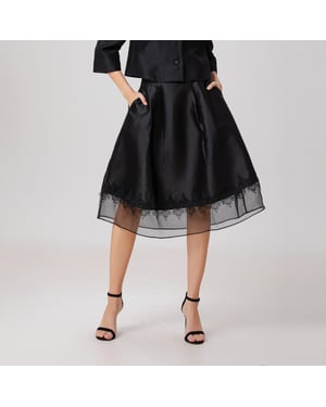 Rok van organza en tafzijde met kanten rand