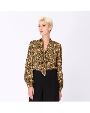 Ascot-tie blouse en kunst-deco print