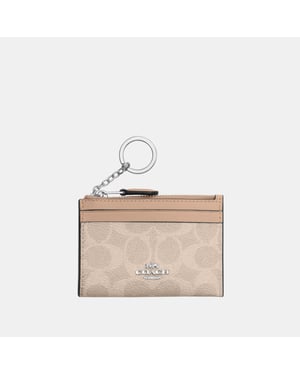 Mini ID Skinny in Signature Canvas