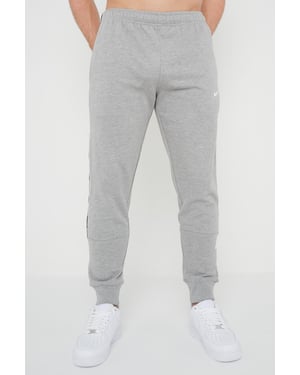 Nike Mens Repeat Taping Logo Fleece Cuffed Joggers in grijs